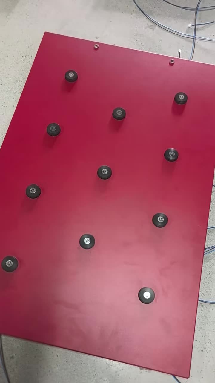 Actual shelf with eleven magnetic charging docks